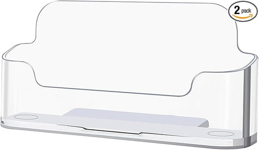 Two clear plastic business card holders on a desk, acrylic display stands for office or exhibition use by American Smart.