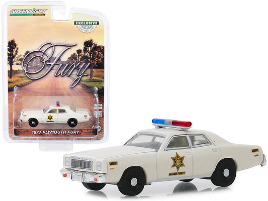 1977 Plymouth Fury diecast model car by Greenlight, cream color, "Hazzard County Sheriff" edition, 1/64 scale, American Smart brand.