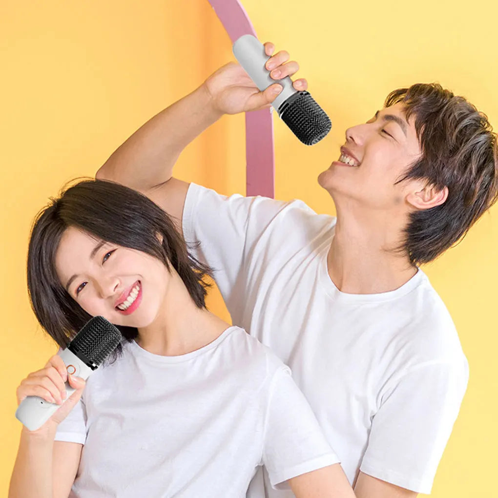 Pink Y2 high-fidelity karaoke machine with microphone from American Smart, lightweight and portable for immersive singing experiences.