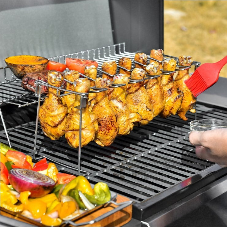 Folding stainless steel grilled chicken leg rack with bottom tray for BBQ, American Smart - EP, showing the rack set up for grilling.