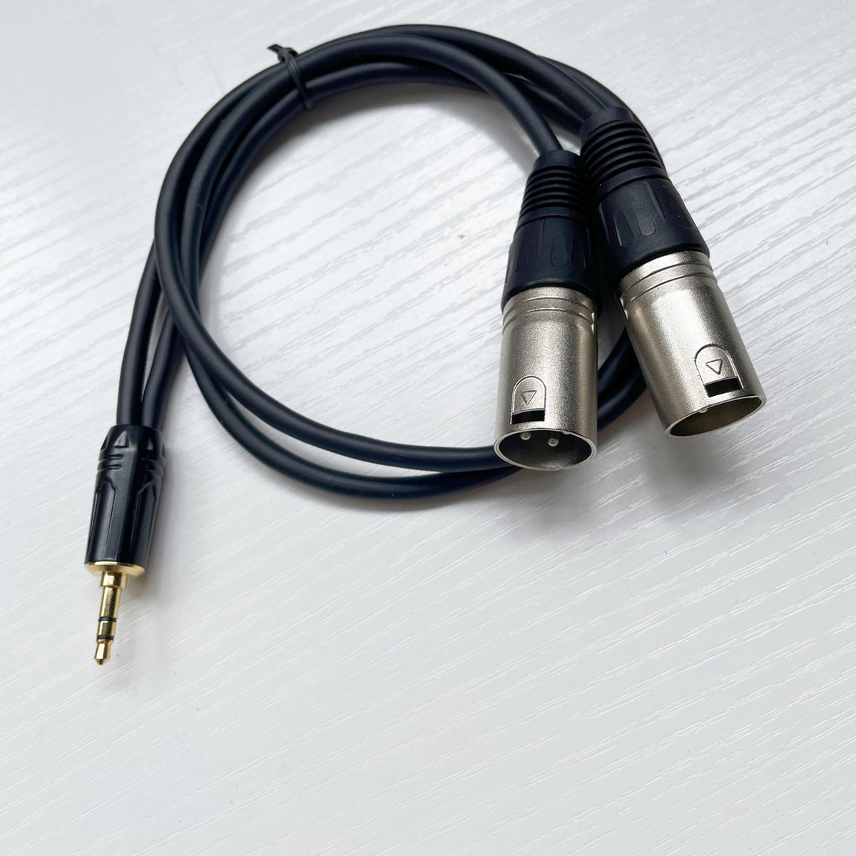 American Smart EP 3.5mm to dual XLR audio cable with three-core connectors for professional audio equipment.