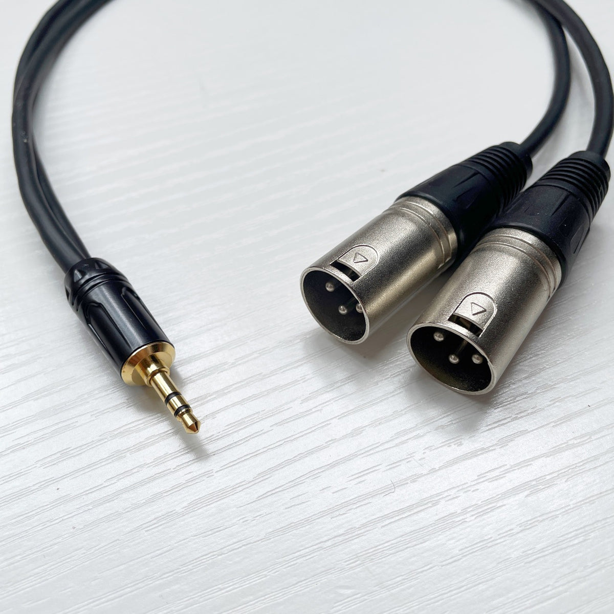 American Smart EP 3.5mm to dual XLR audio conversion cable with three core pairs, male and female connectors for professional sound setups