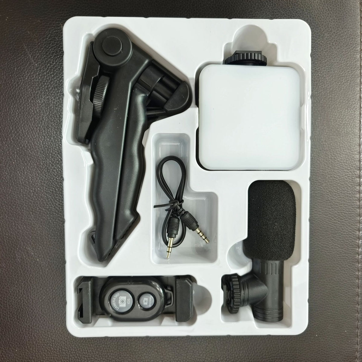 American Smart EP desktop beauty leg pocket fill light with microphone, handheld conference lamp, and single reflex photography setup.