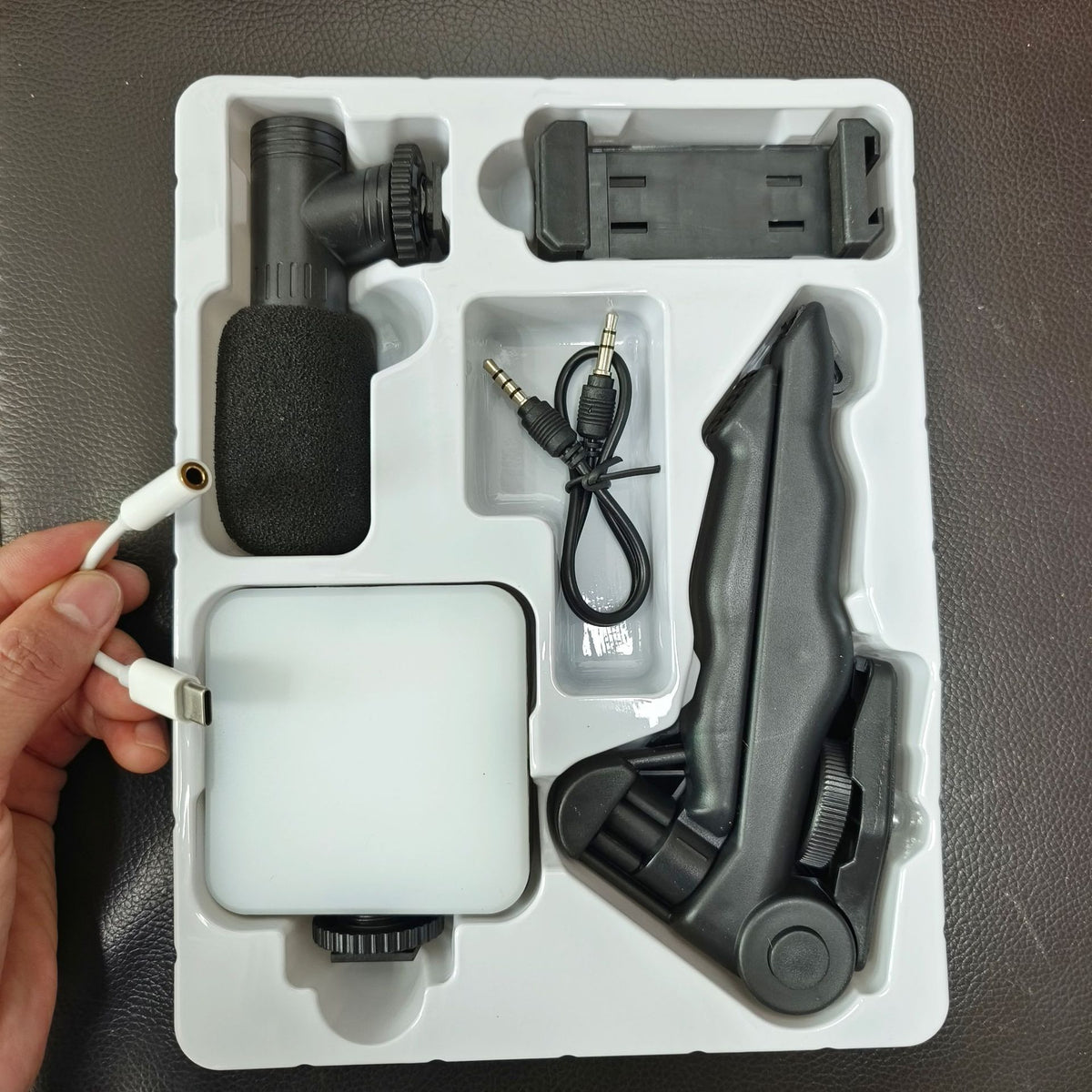 American Smart EP desktop beauty fill light with microphone, handheld conference lamp, and reflex photography equipment.