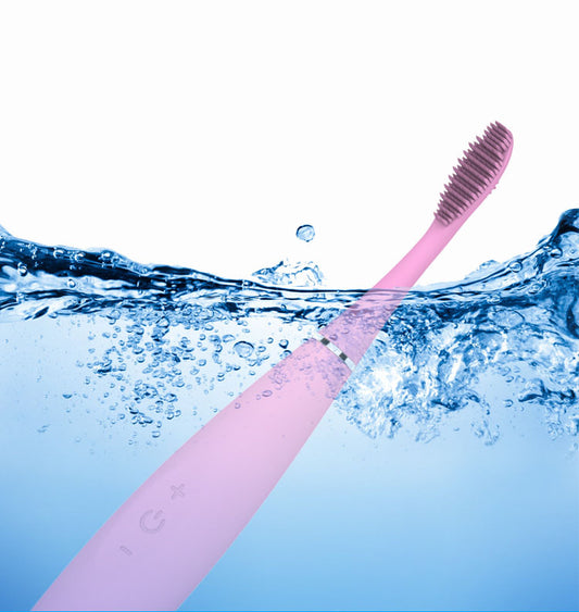 American Smart MCMELLCAO electric silicone toothbrush with rechargeable design and sonic cleaning capabilities, shown in the image.