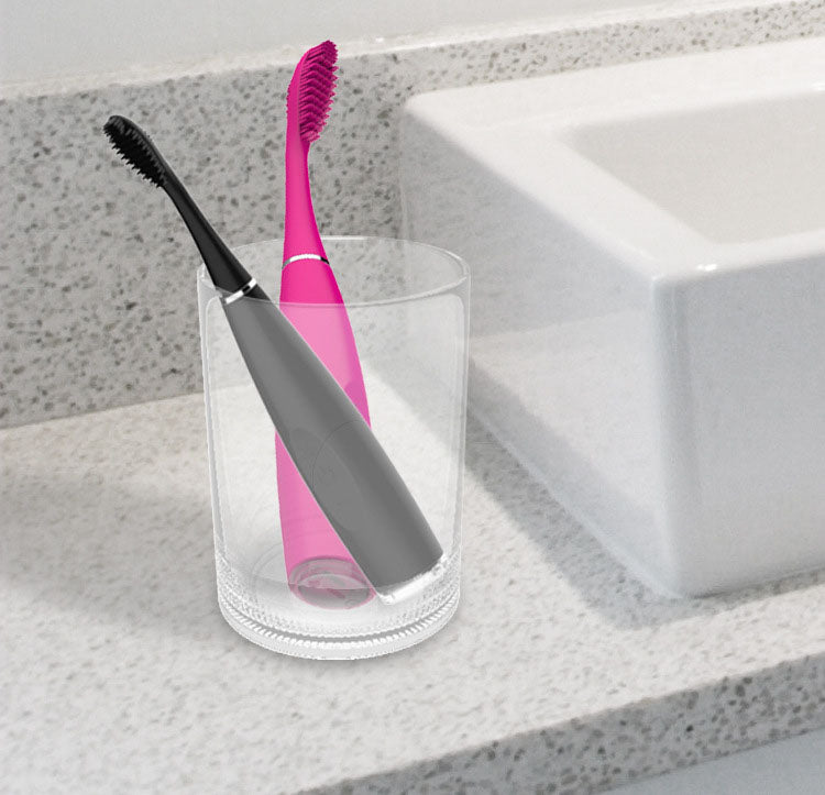 American Smart MCMELLCAO electric silicone toothbrush with rechargeable design and sonic cleaning technology, shown in the image.