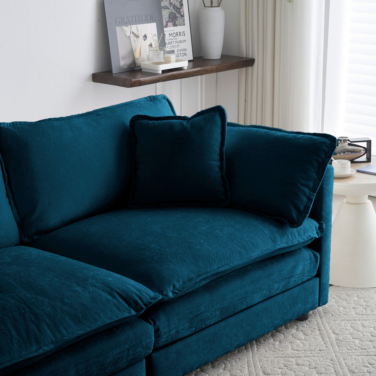 Blue modern ottoman-style chair by American Smart with cushioned chenille armrest for living room or bedroom use.