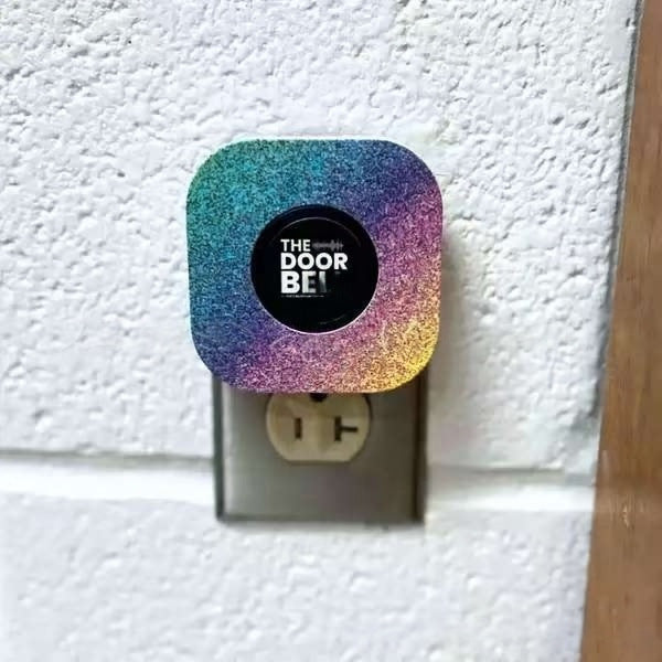 Wireless emergency help button by American Smart, designed for elderly safety, featuring a compact SOS caller for quick assistance.