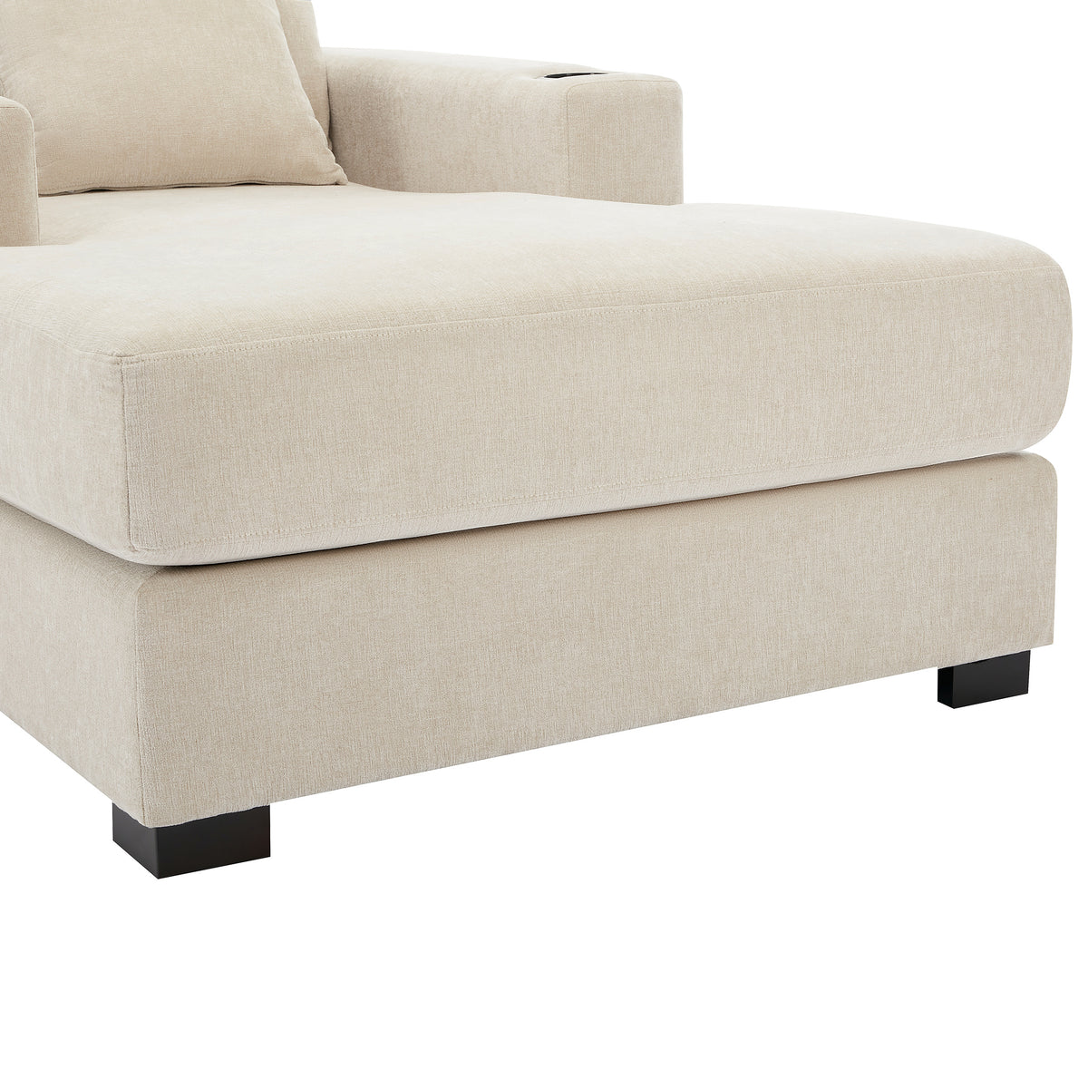 Cream oversized chaise lounge sofa with pillows, charge station, cup holders, and chenille fabric in modern style.
