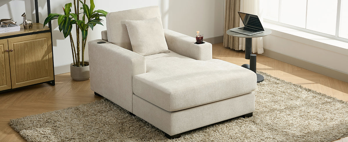 Cream oversized chaise lounge sofa with pillows, charge station, and cup holders in modern style, upholstered in chenille fabric.
