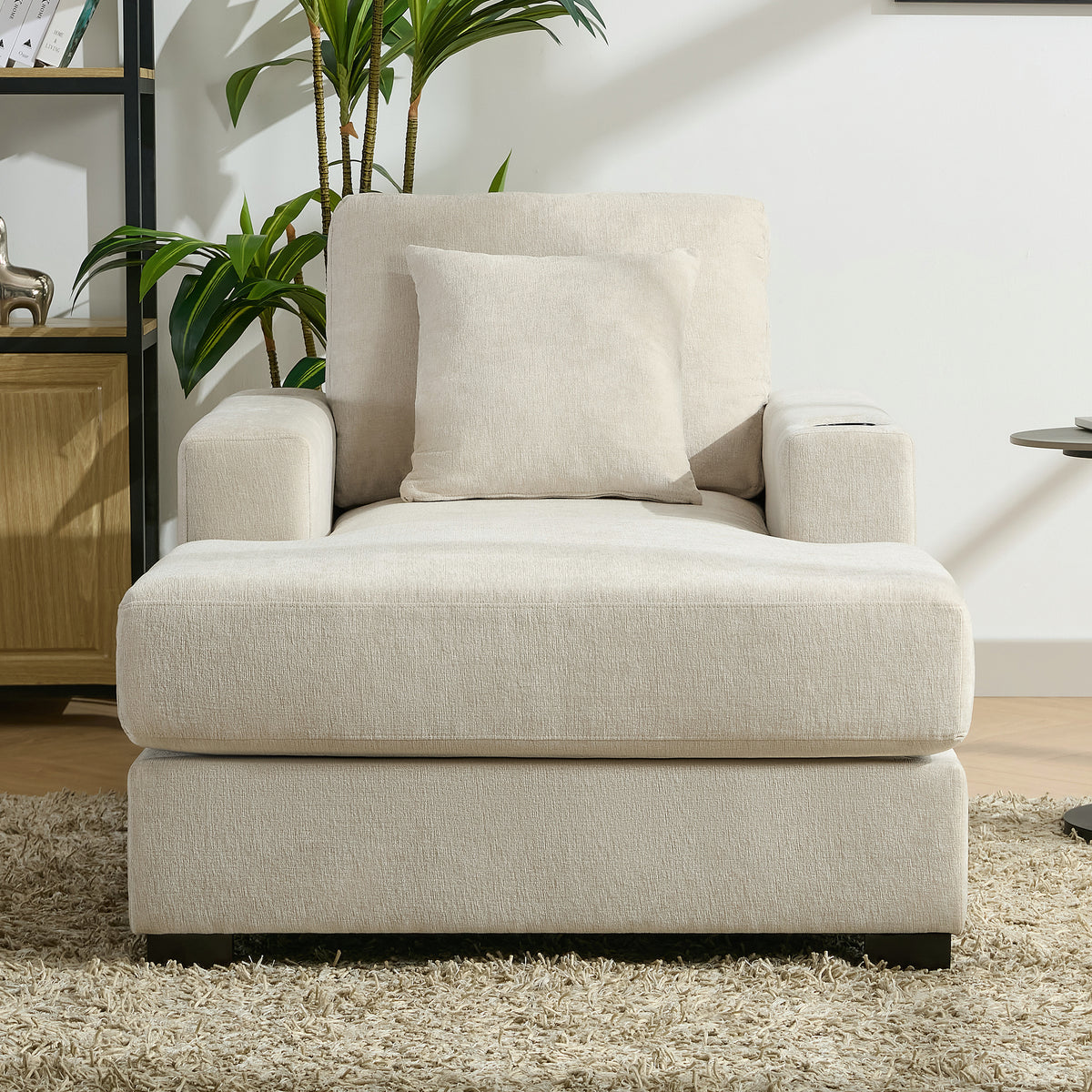 Cream oversized modern chaise lounge sofa with pillows, charge station, and cup holders in chenille fabric.