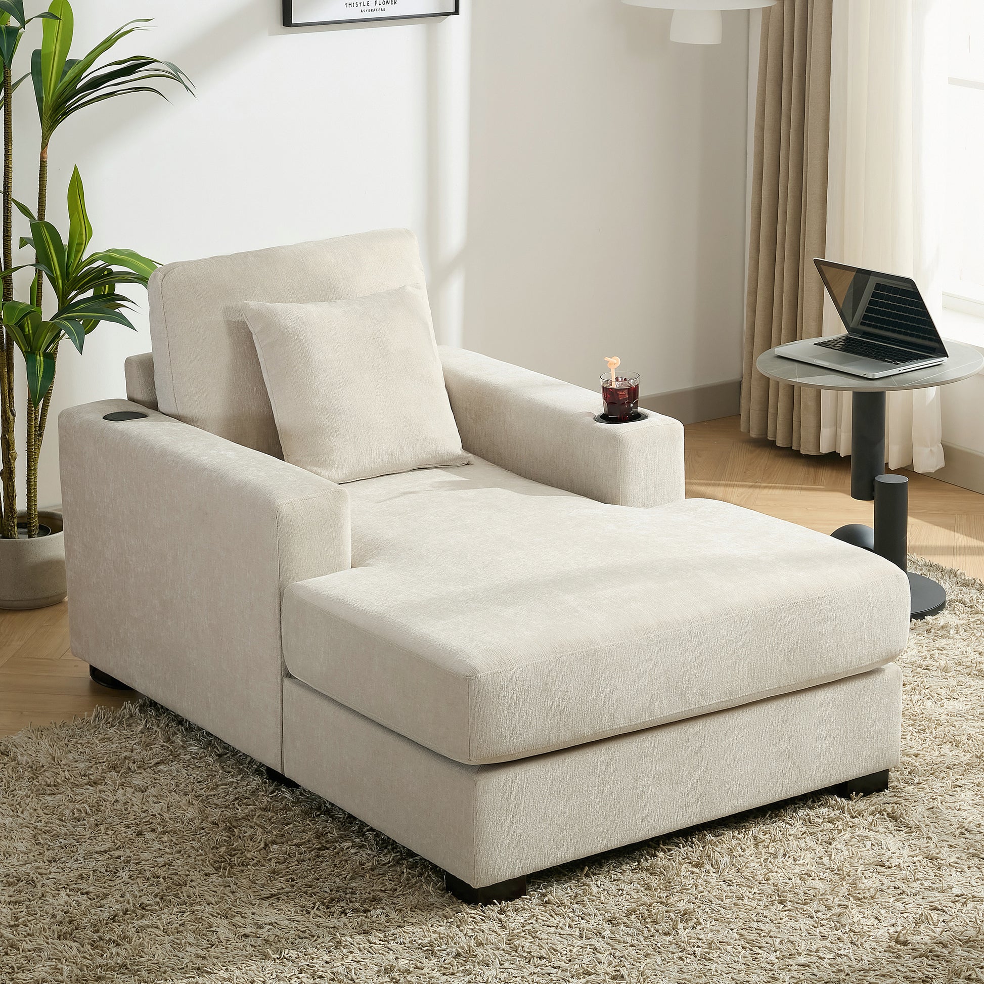 Cream oversized chaise lounge sofa with pillows, charge station, and cup holders in modern style, upholstered in chenille fabric.