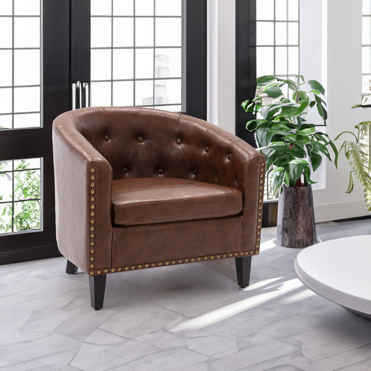 American Smart PU leather tufted barrel chair with rounded design, suitable for living room, bedroom, or club seating.