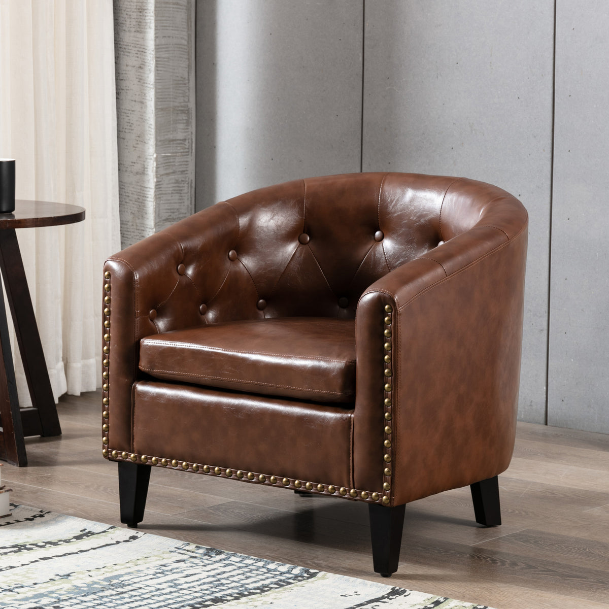 American Smart EP PU leather tufted barrel chair with rounded design, ideal for living room or bedroom decor.