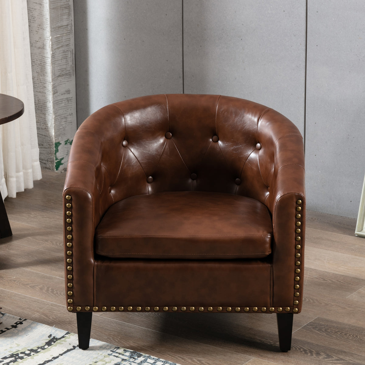 American Smart PU leather tufted barrel chair with a rounded design, ideal for living rooms, bedrooms, or club seating.