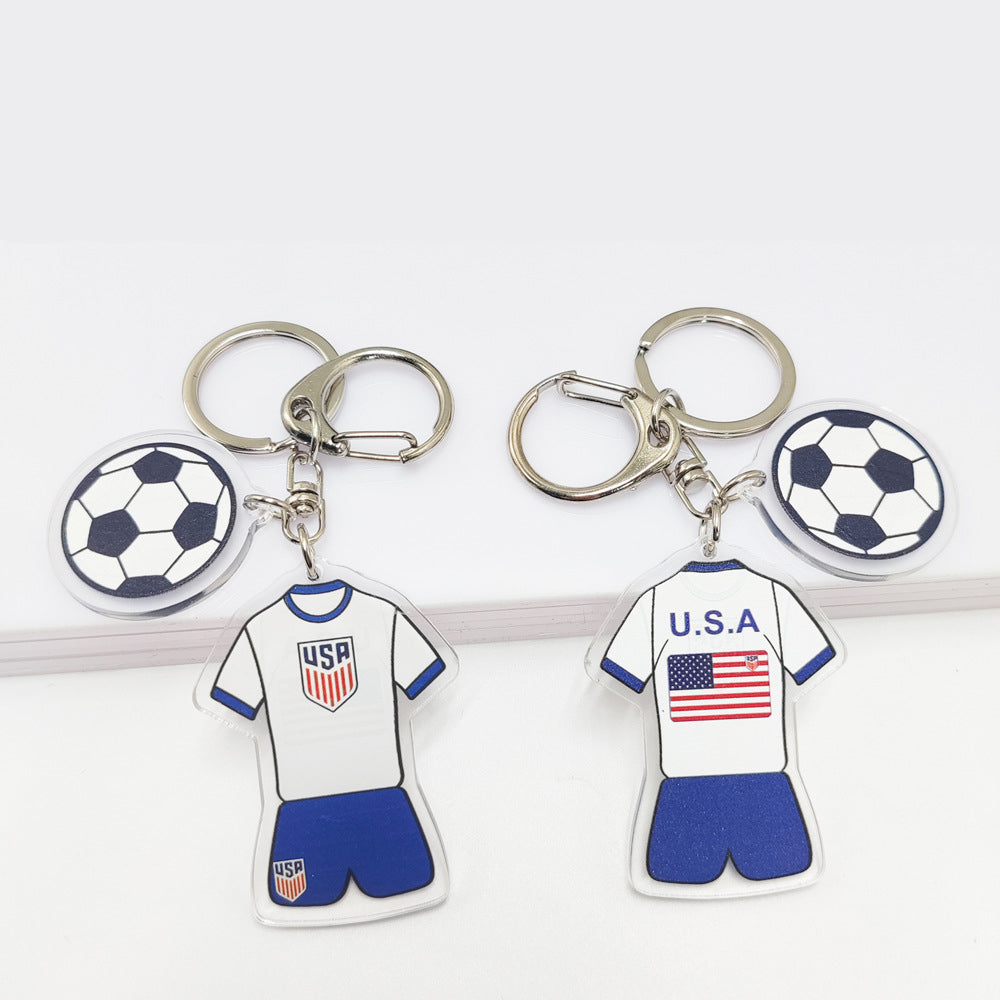 Acrylic Qatar World Cup souvenir key chain featuring Germany and France flags, football pattern pendant, and American Smart branding.