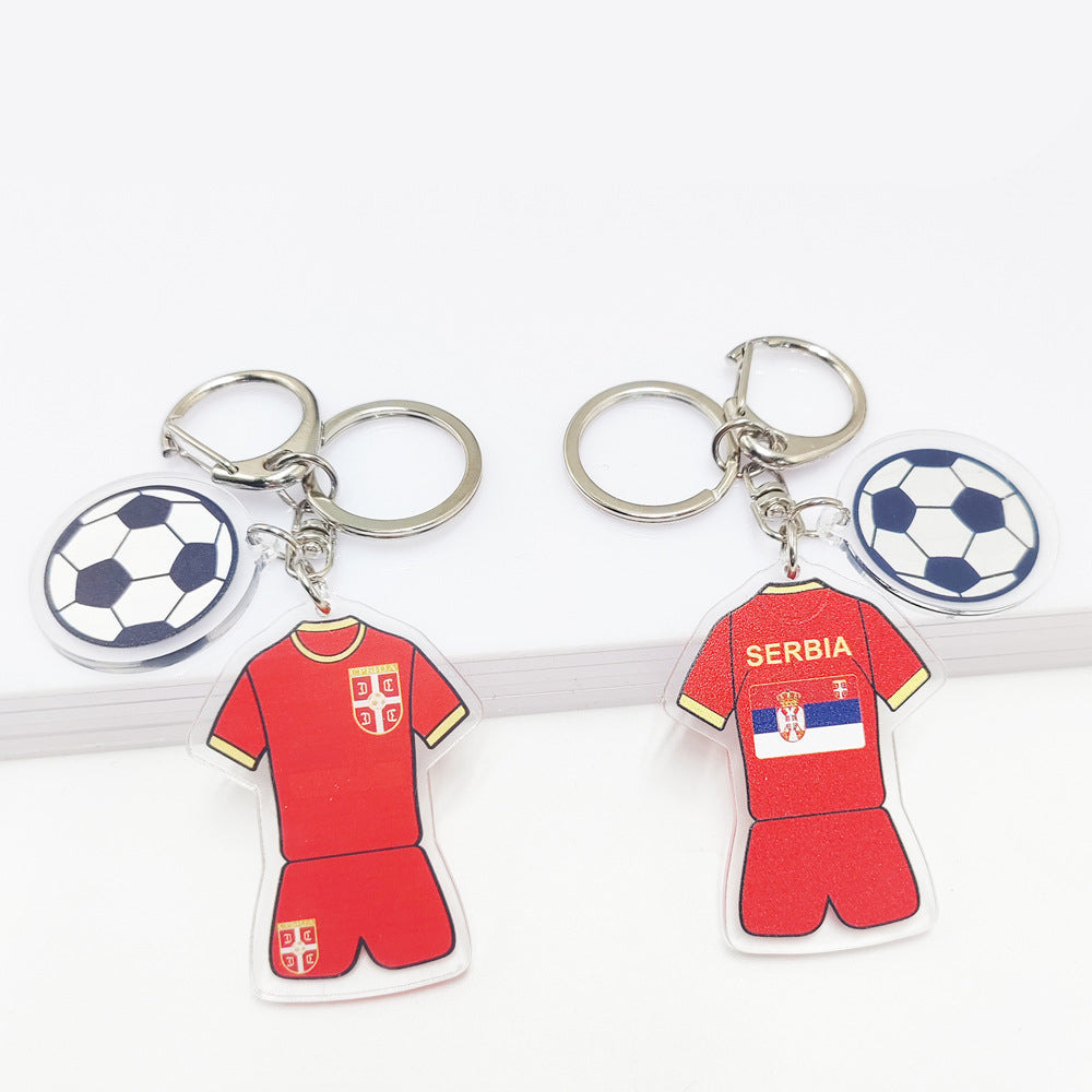 Qatar Football World Cup souvenir key chain featuring Germany and France flags, acrylic jersey design with football pattern pendant.