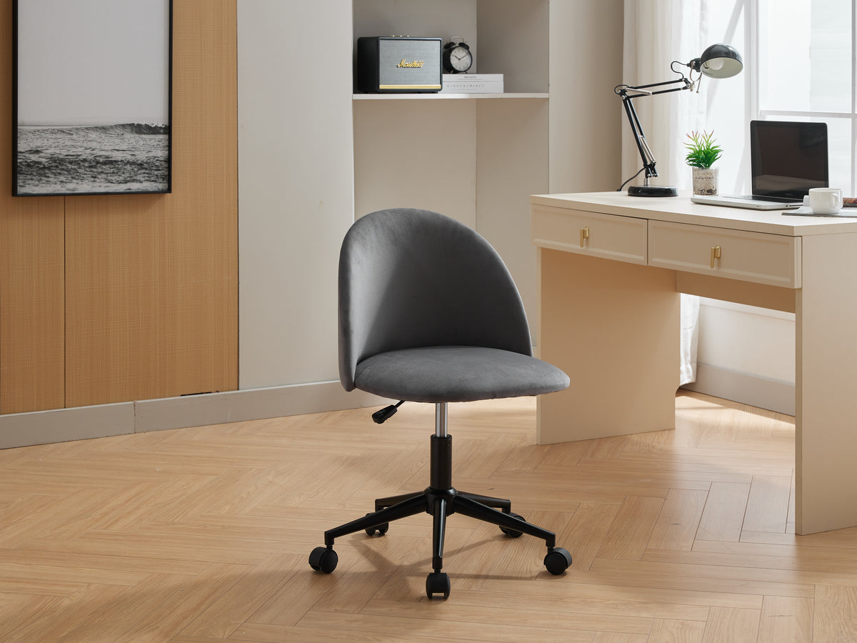Black velvet fabric office chair with cushioned seat, mid back, adjustable height, wheels, and black legs, ideal for home or office use.