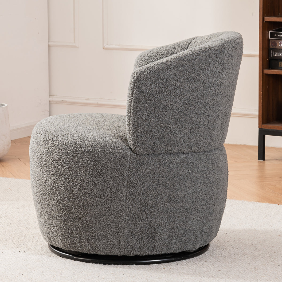 Grey plush swivel accent chair with round arms and metal base, American Smart EP contemporary living room armchair.