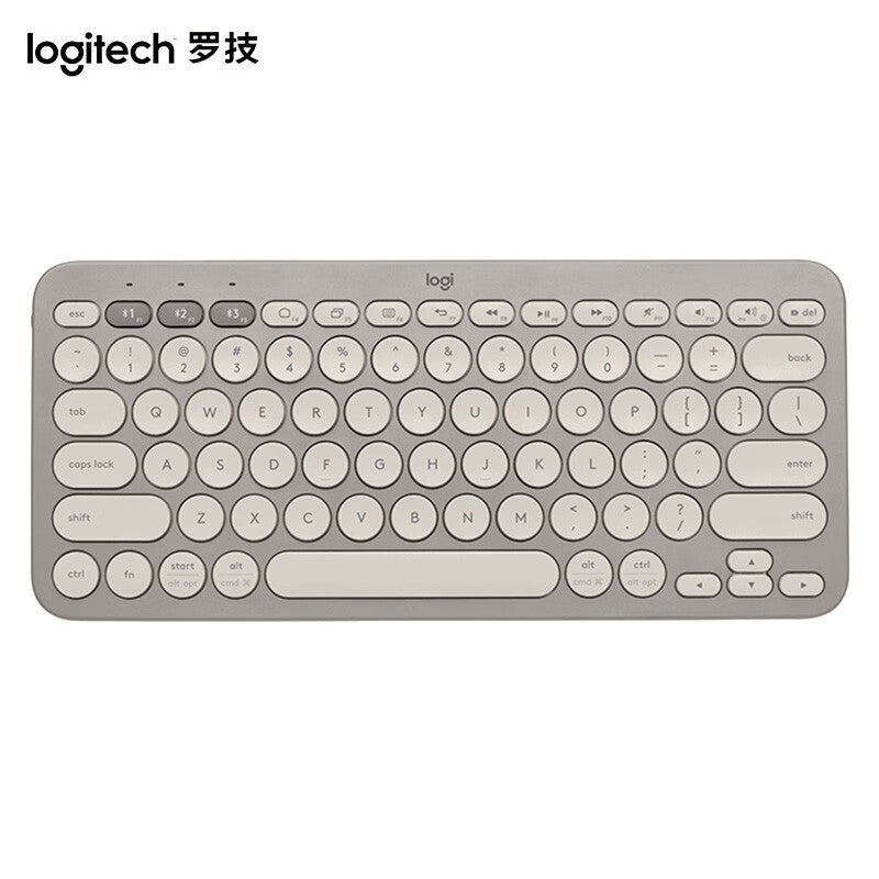 Logitech K380 mini Bluetooth wireless keyboard with tablet and phone set, featuring a compact design and multi-device connectivity.