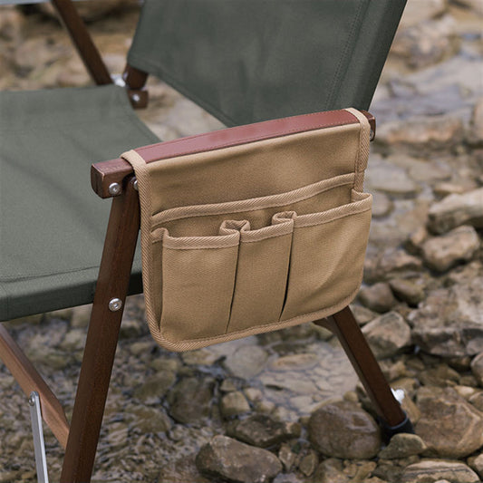 Outdoor camping chair armrest hanging storage bag by American Smart - EP, shown attached to a chair armrest for multifunctional storage.