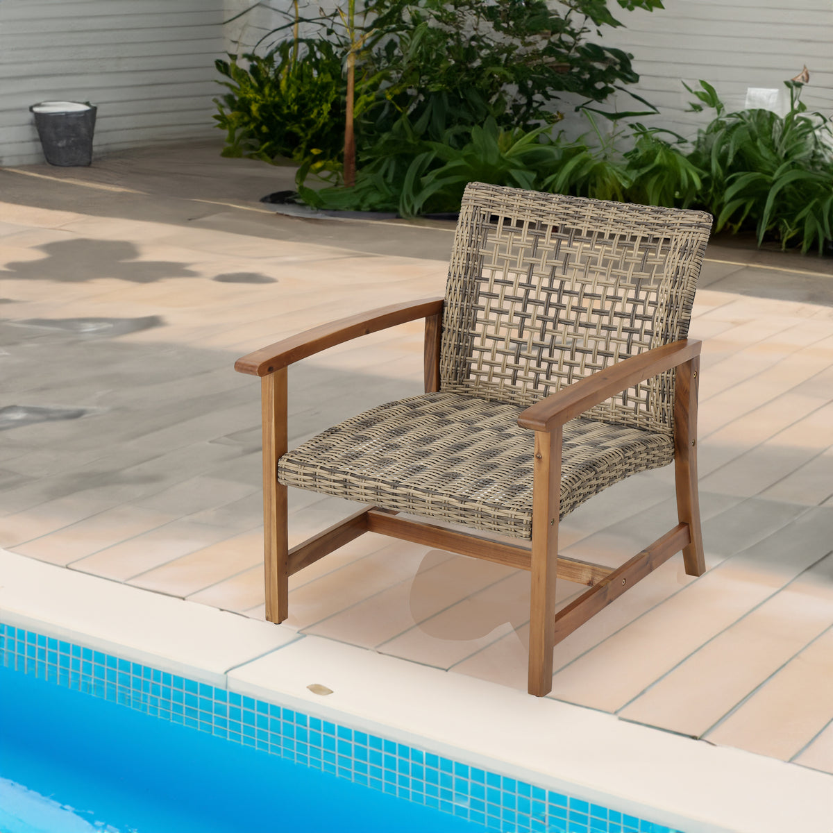 Set of two Hampton wood and wicker club chairs by American Smart, featuring classic design with wooden frames and woven wicker seats.