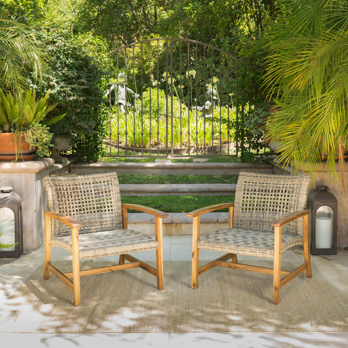 Set of two Hampton wood and wicker club chairs by American Smart, featuring comfortable upholstery and stylish woven wicker accents.