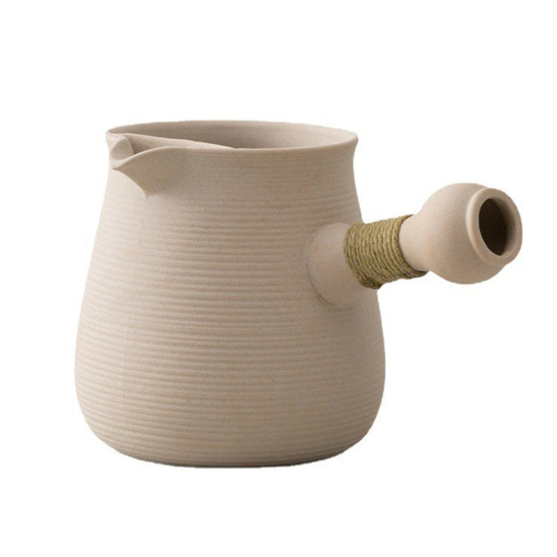 White Mud Boiled Teapot 600ml from American Smart EP, featuring a ceramic design with a sturdy handle and spout.