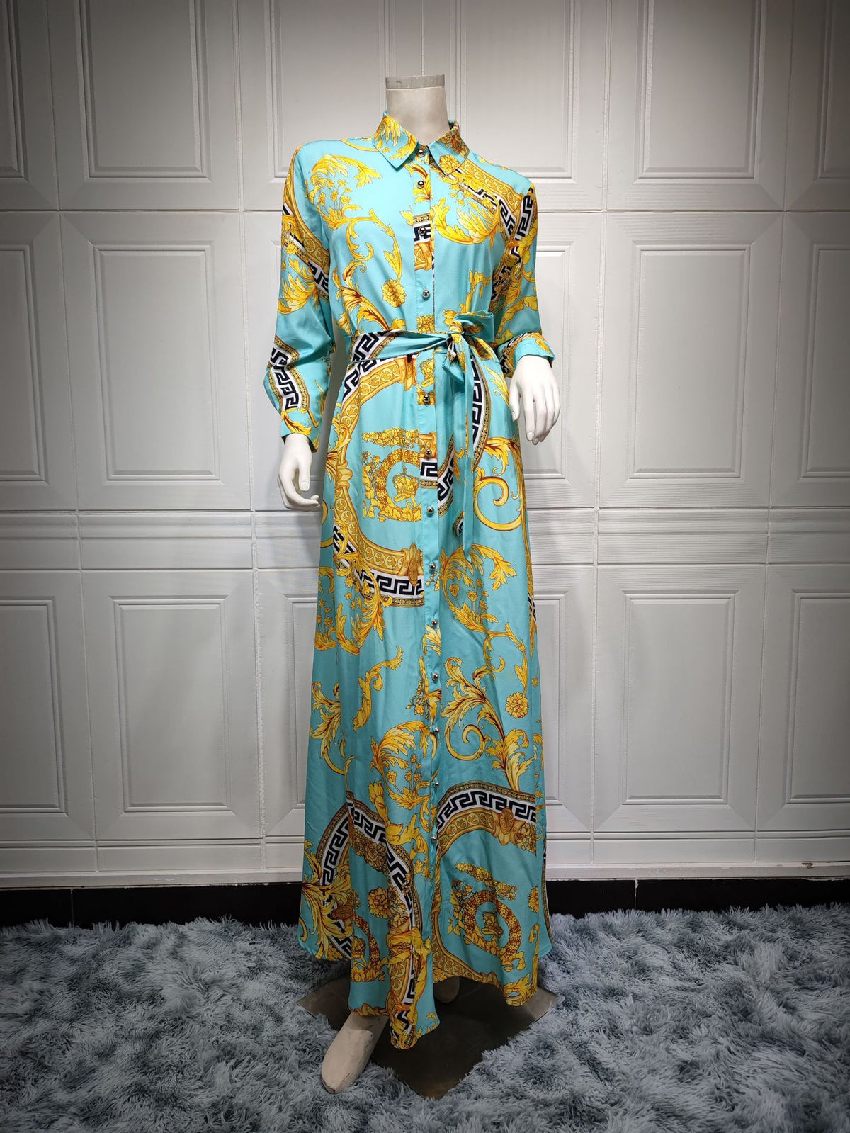 Ladies print shirt dress by American Smart EP, featuring a stylish Middle East-inspired design and comfortable fit.