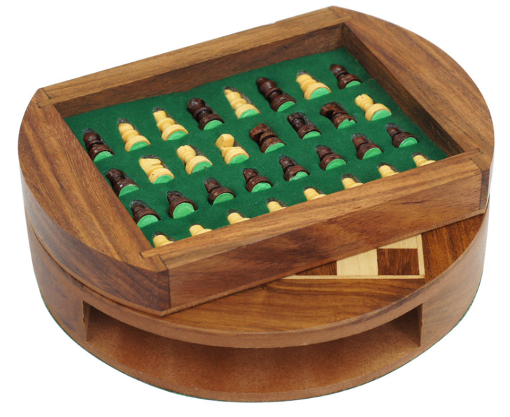 Magnetic wooden chess set by American Smart EP with black and natural wood pieces on a chessboard.