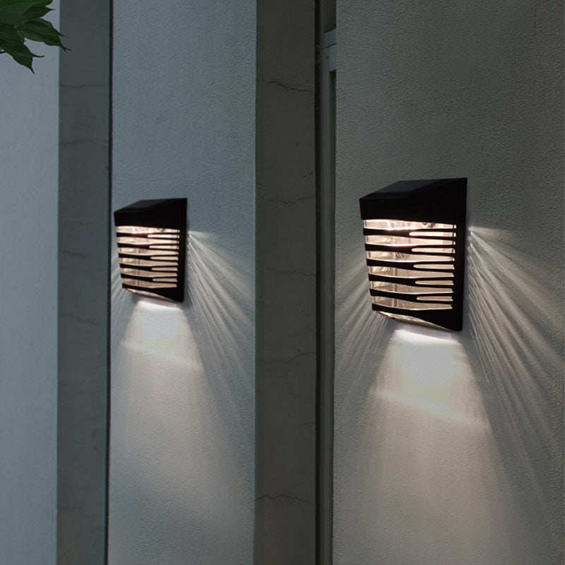 American Smart outdoor solar stair lights with warm LED glow, durable ABS material, ideal for garden pathways and ambient home lighting.