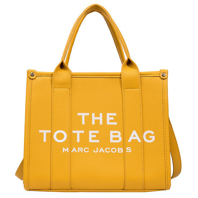 Small women's trendy tote bag by American Smart featuring a stylish single shoulder and crossbody design in black leather.