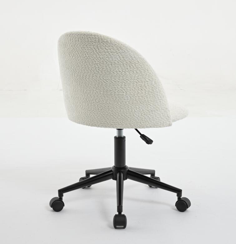Black velvet fabric office chair with white cushions, mid-back, adjustable, rotating, wheeled computer chair with black legs.