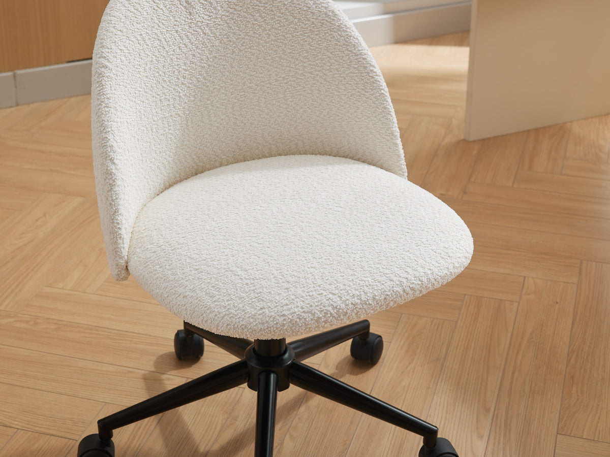 White velvet fabric office chair with black legs, cushioned seat, mid back support, adjustable height, and rolling wheels.