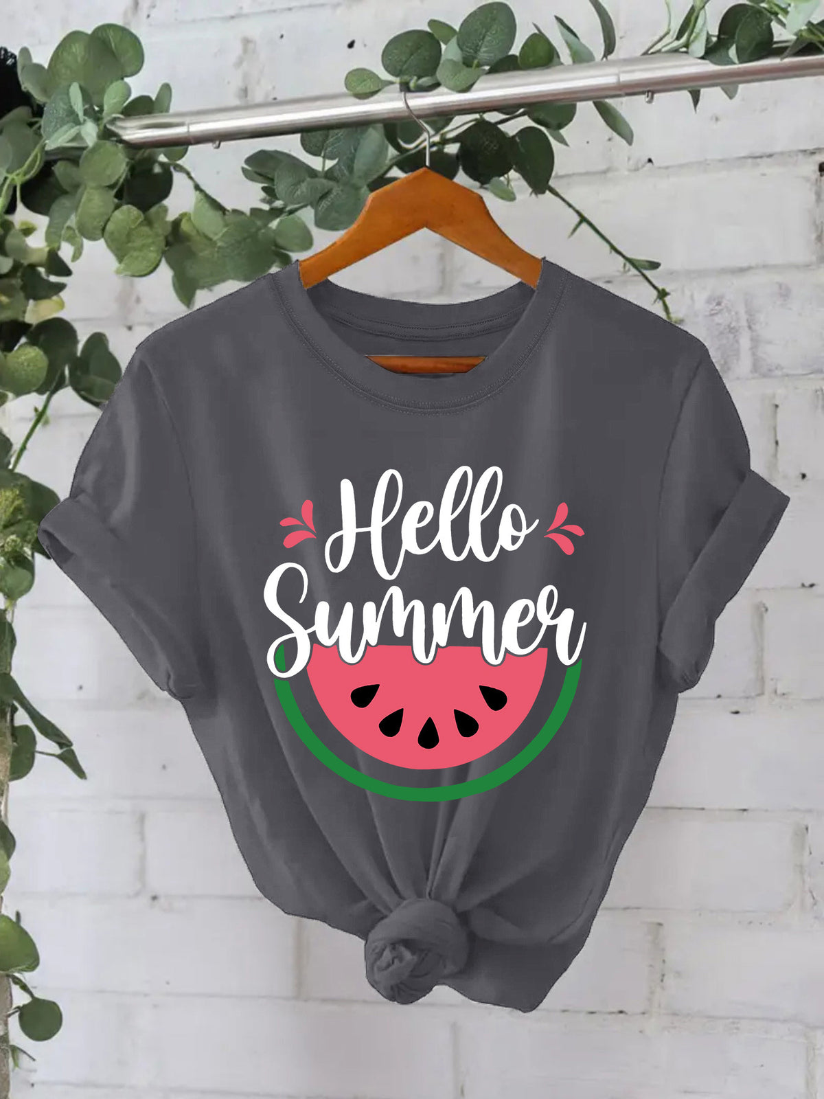 White short-sleeved shirt from American Smart EP featuring a colorful watermelon design for a summery look.