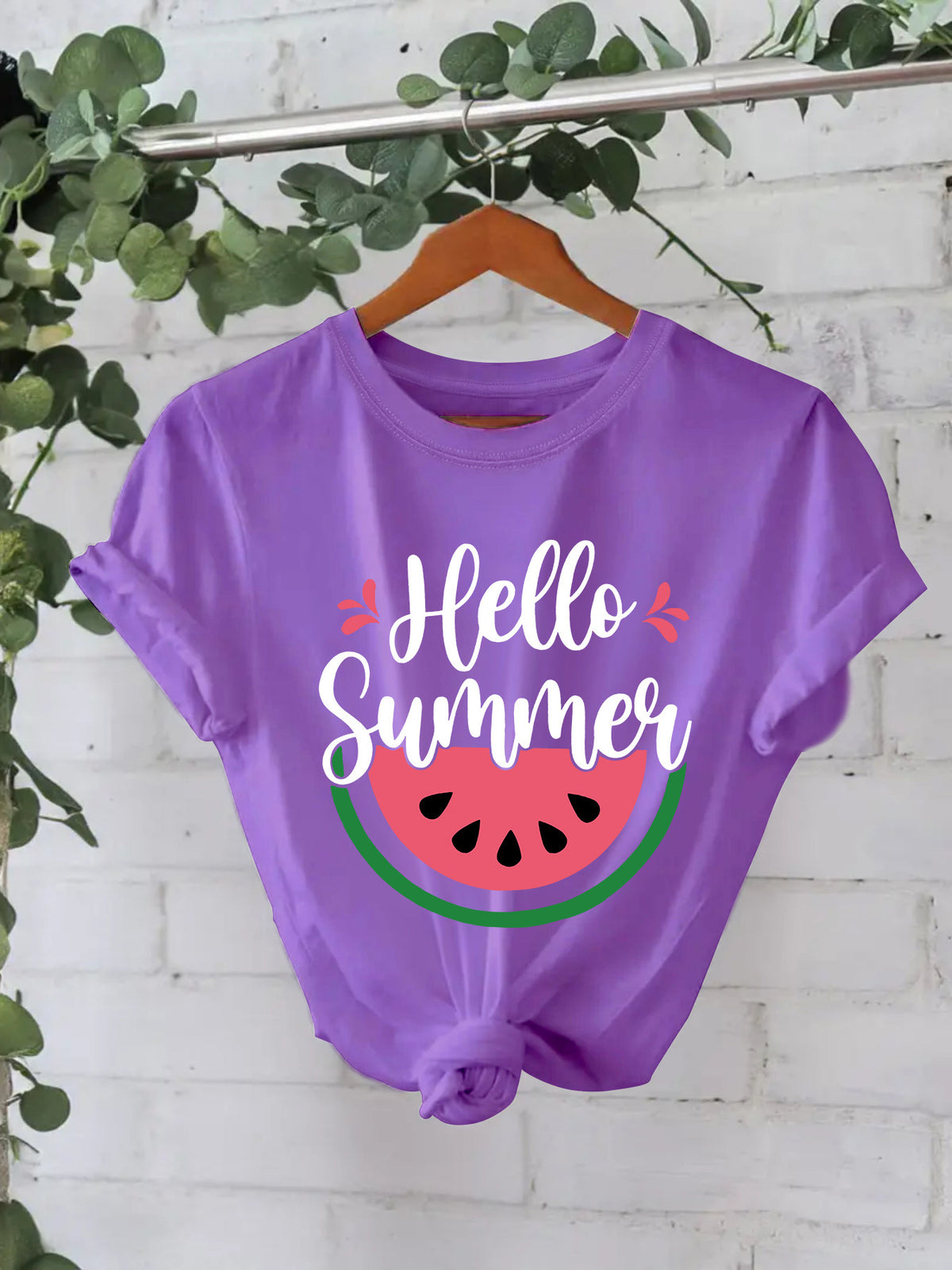 White short-sleeved watermelon shirt by American Smart - EP featuring colorful fruit print on the front.