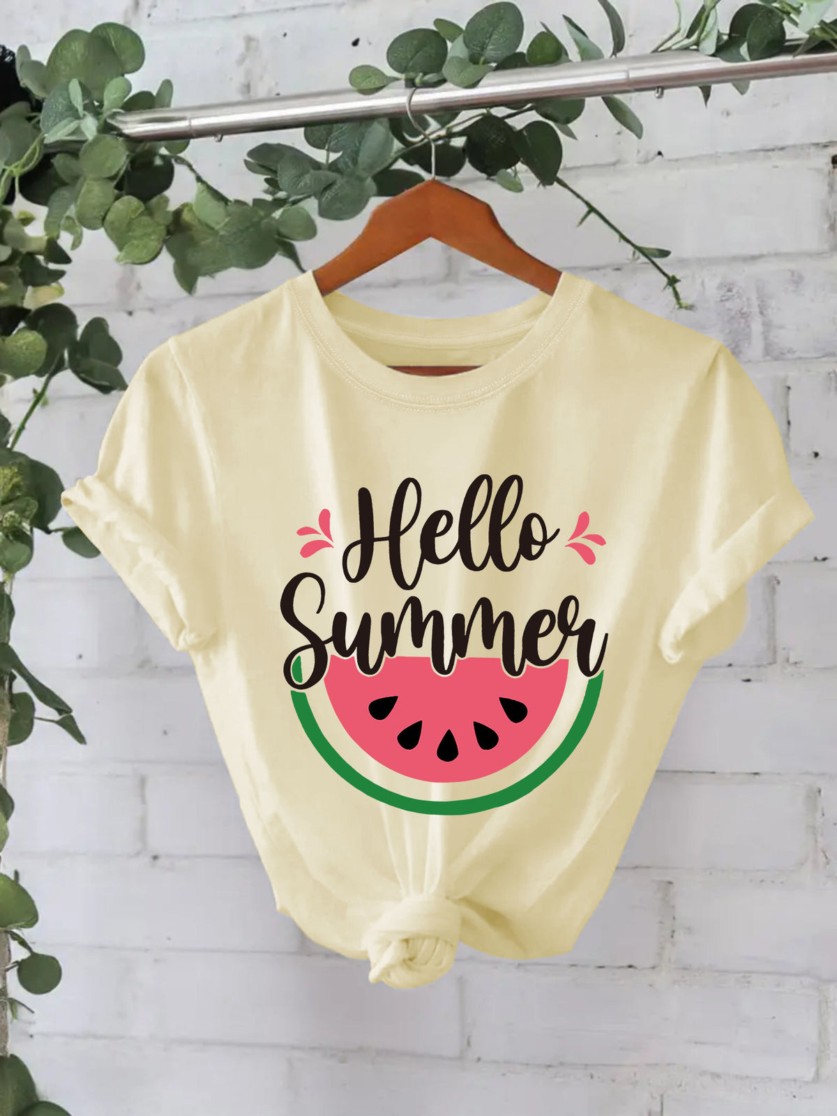 White short-sleeved shirt by American Smart EP featuring a colorful watermelon design for a summer look.
