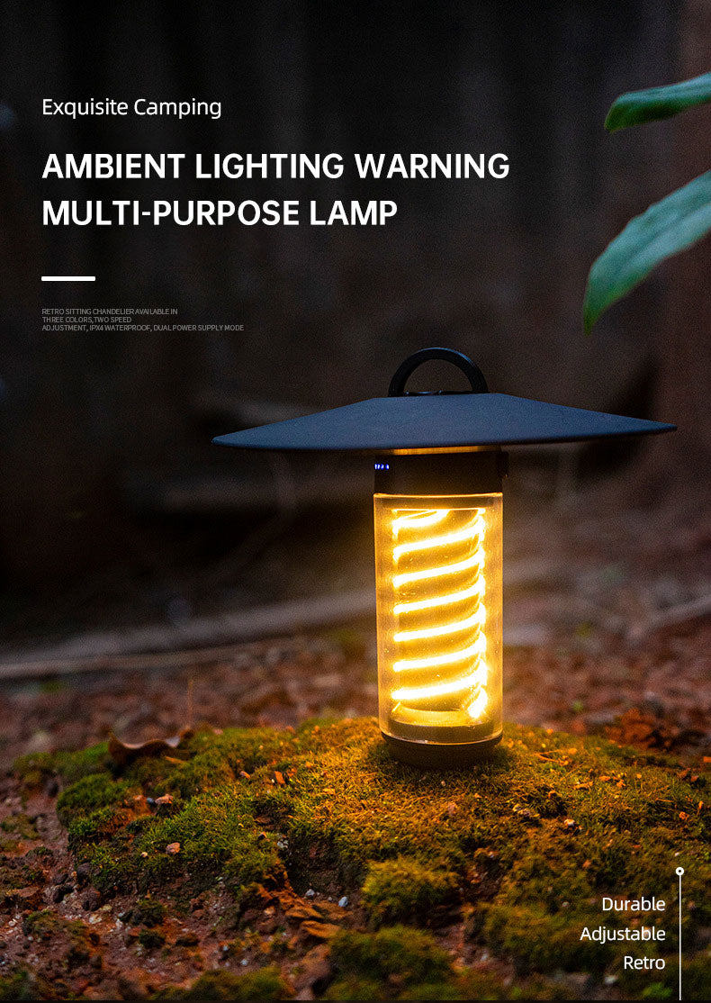 Portable American Smart outdoor camping light with tripod stand, lantern-style marquee tent atmosphere light for nighttime illumination.