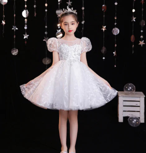 Girls tiered lace flower appliqué communion dress by American Smart, featuring delicate lace layers and floral details.