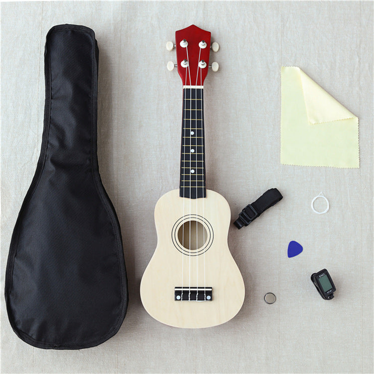 Wooden 21-inch ukulele by American Smart WB, showing the polished wooden body and four strings on a plain background.
