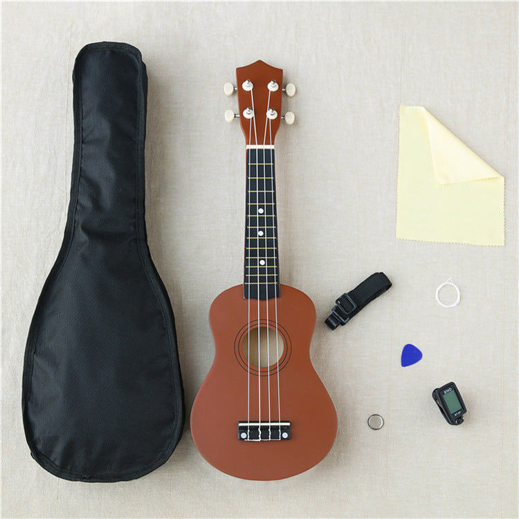 Wooden 21-inch ukulele by American Smart WB, featuring a natural finish and compact design, suitable for beginners or play.