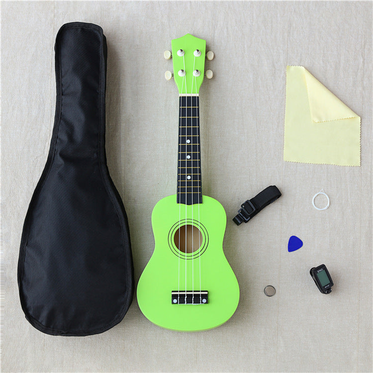 Wooden 21-inch ukulele by American Smart WB, shown with colorful toy figures and musical accessories on a wooden surface.