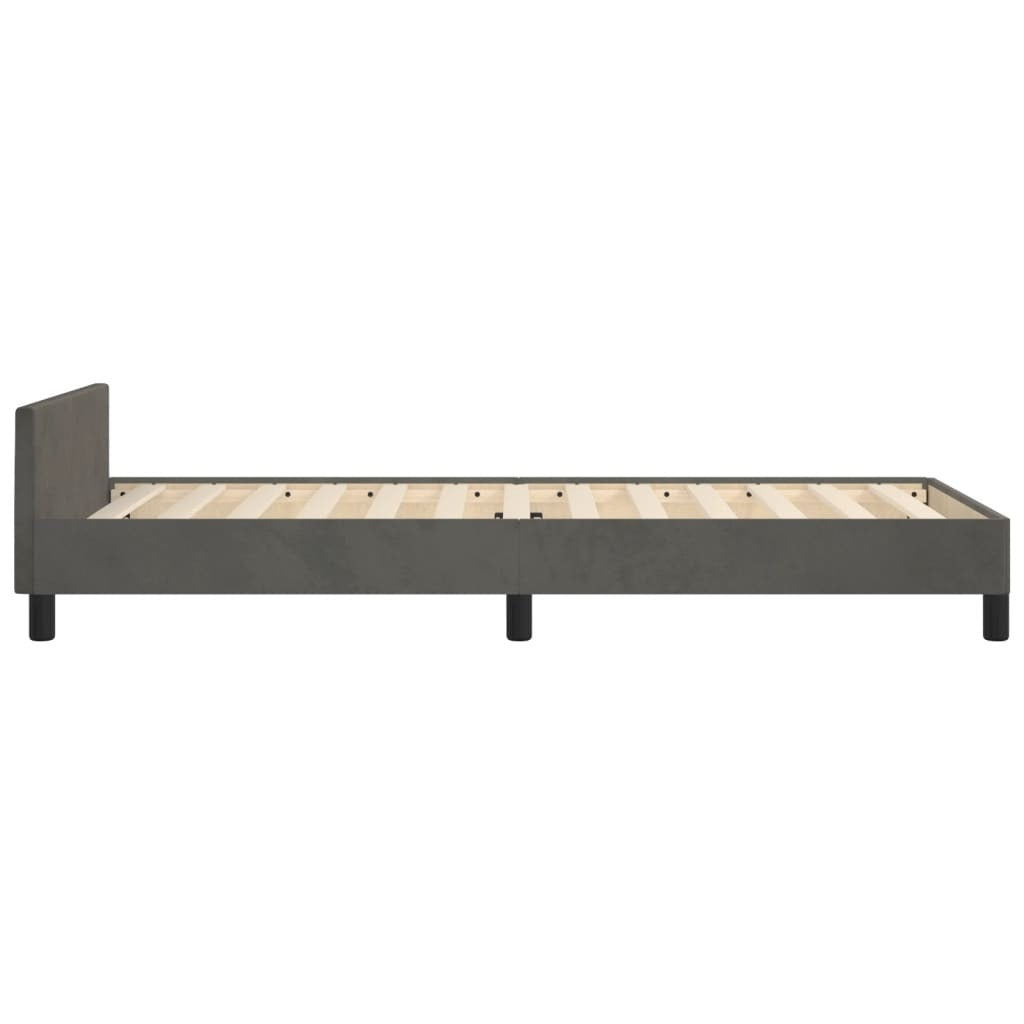 Dark gray twin velvet bed frame from American Smart WB, showcasing a modern, sleek design without mattress in a bedroom setting.