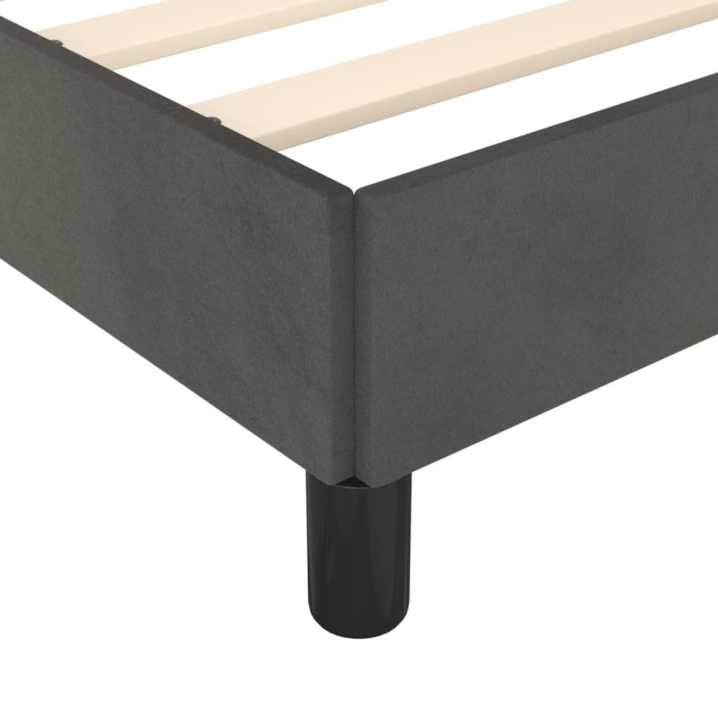Dark gray twin velvet bed frame by American Smart WB, showcasing a modern, sleek design without a mattress in a bedroom setting.