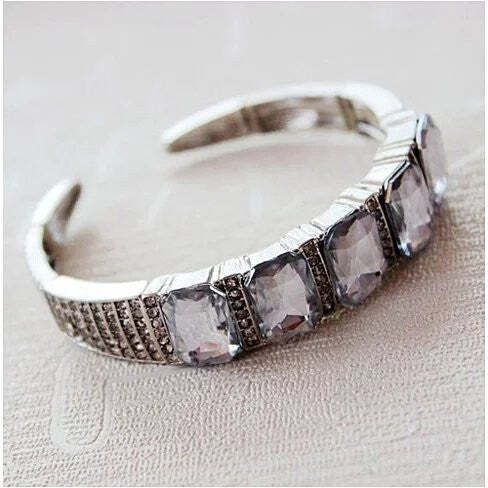 American Smart diamond crystal open-ended bracelet with sparkling stones and sleek silver design, stylish jewelry for elegant wear.