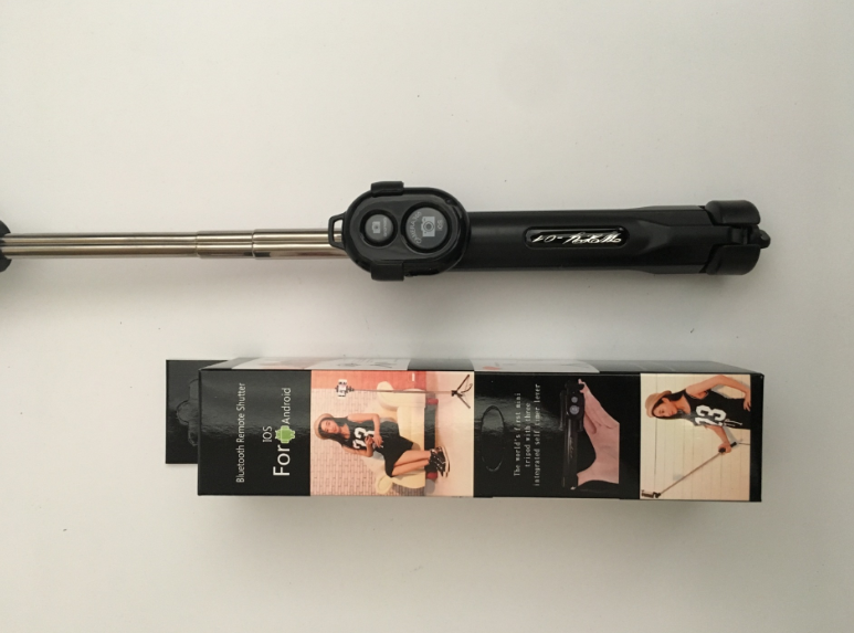 Stainless steel telescopic Bluetooth selfie stick by American Smart WB with adjustable phone clamp for selfies and photos.