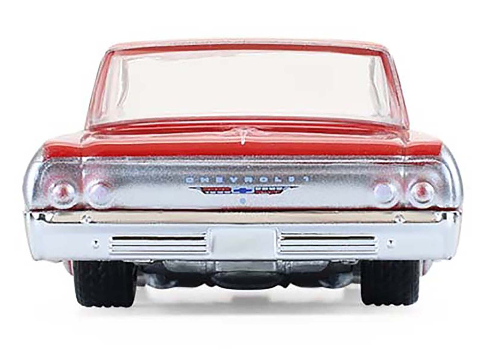 Silver and red two-tone 1964 Chevrolet Biscayne lowrider diecast model car by Greenlight, part of the California Lowriders Series 7.