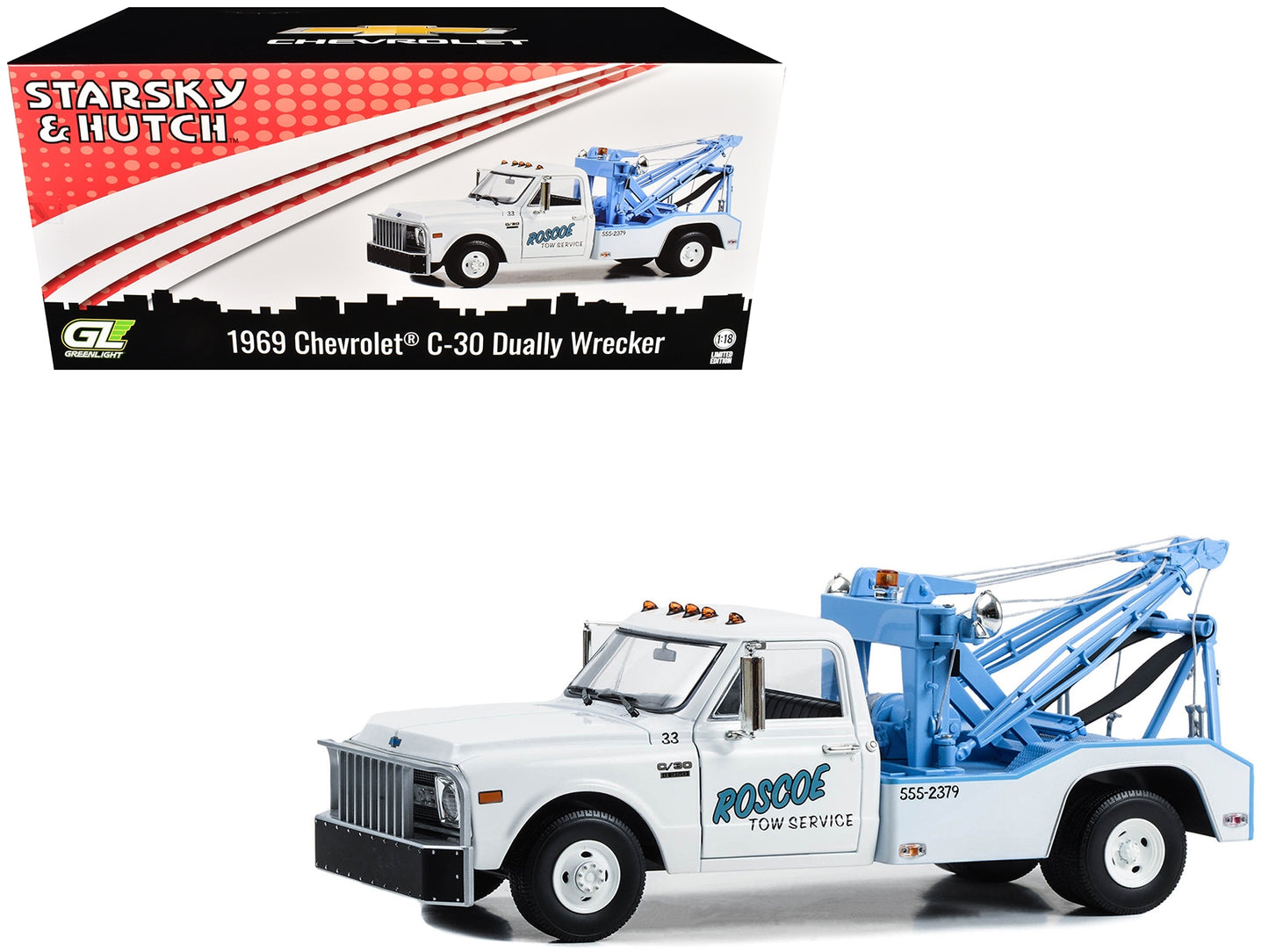 1969 Chevrolet C-30 Dually Wrecker Tow Truck diecast model by Greenlight, white with "Roscoe Tow Service" and "Starsky and Hutch" branding.