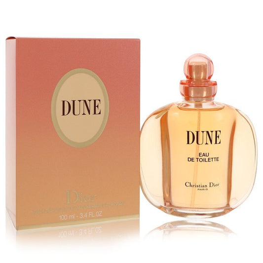 Christian Dior Dune Eau De Toilette spray 3.4 oz for women with the elegant perfume bottle and packaging.