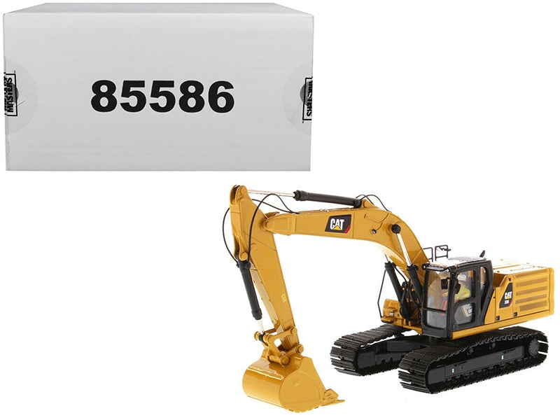 Diecast model of the CAT Caterpillar 336 Next Generation hydraulic excavator by Diecast Masters, detailed construction model.
